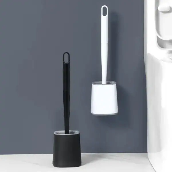 Brosse WC suspendue en silicone, modèle noir et blanc, design moderne pour salle de bain.