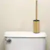 Brosse WC or, design moderne, élégante, pour salle de bain.