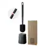 Brosse WC en silicone suspendue avec support et boîte d'emballage.
