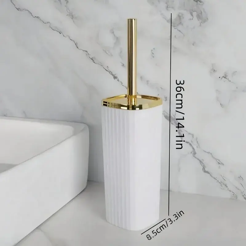 Brosse WC élégante blanc et doré, design moderne pour salle de bain.