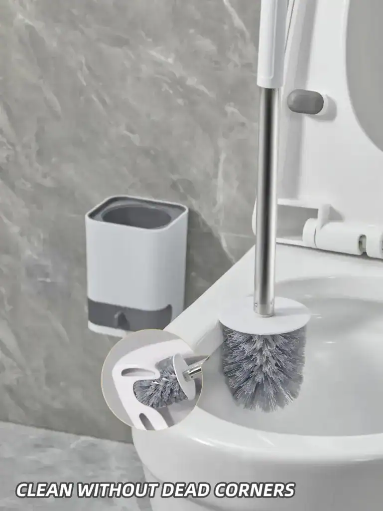 Brosse WC avec support mural, nettoyage sans coins morts, design gris et blanc.