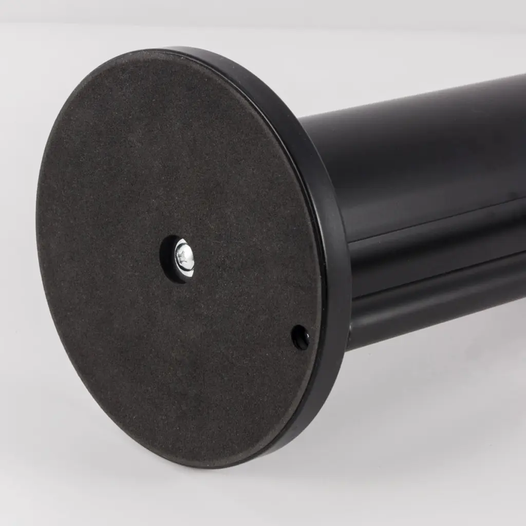 Base noire d'un porte papier toilette combiné avec brosse WC, design moderne et pratique.