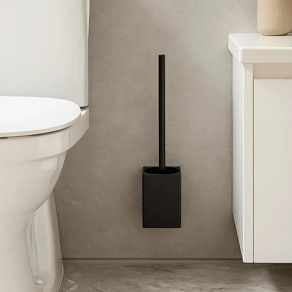 Brosse toilette murale noire, design moderne pour salle de bain.