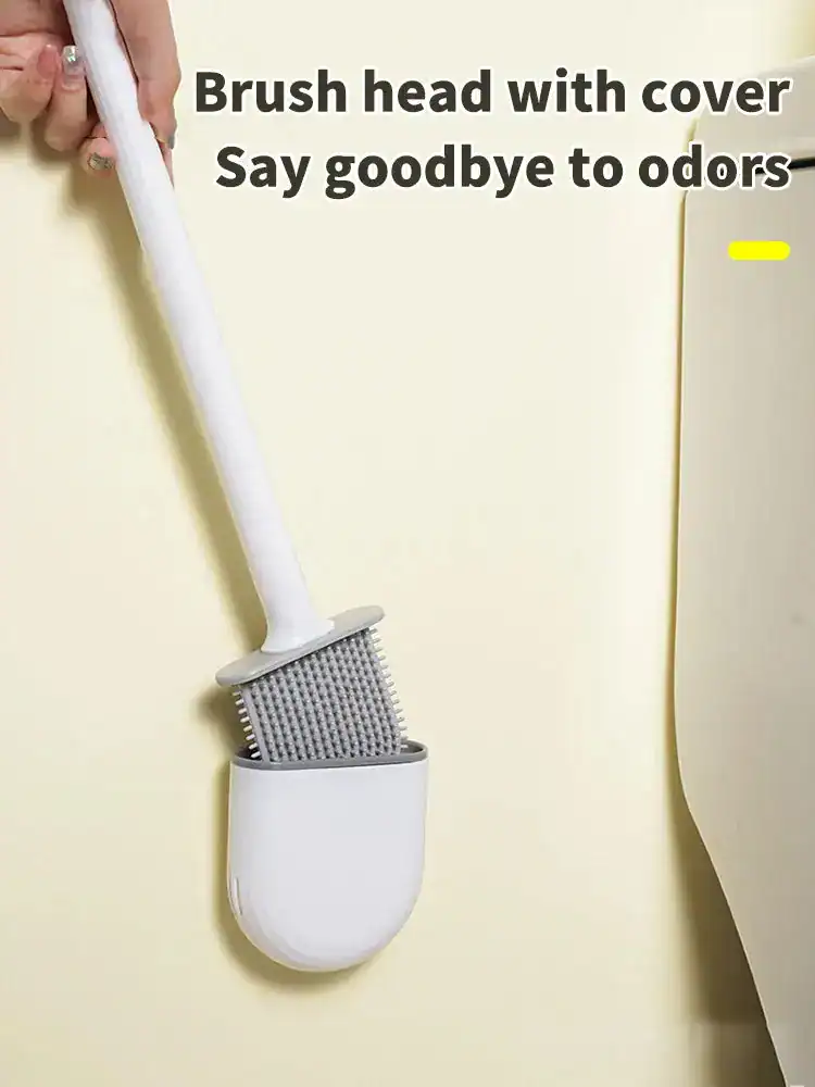 Brosse WC murale blanche avec tête de brosse couverte, idéale pour une propreté optimale.