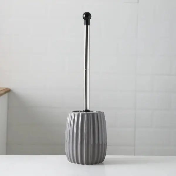 Brosse WC céramique grise, design moderne, pour salle de bain.